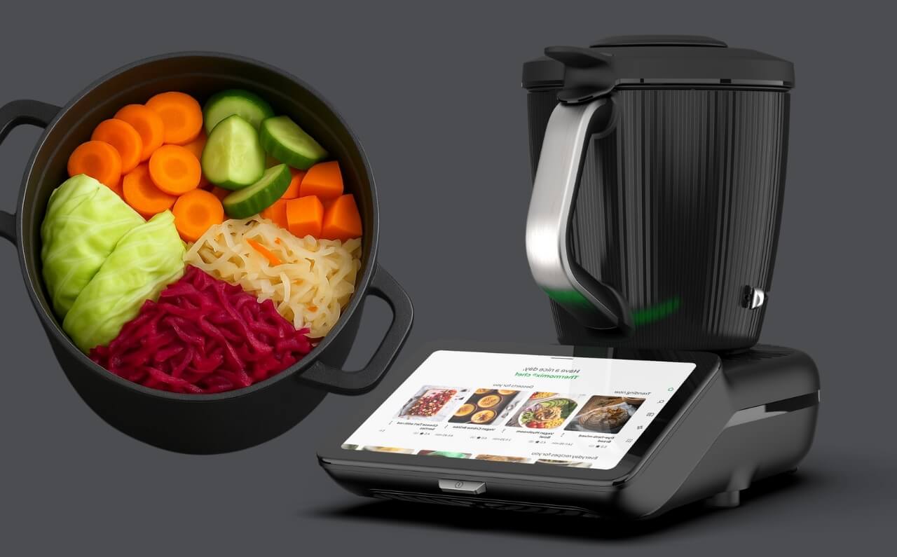 Thermomix 7 displayed alongside jars of homemade fermented meals, showcasing its ability to create gut-friendly recipes with ease.