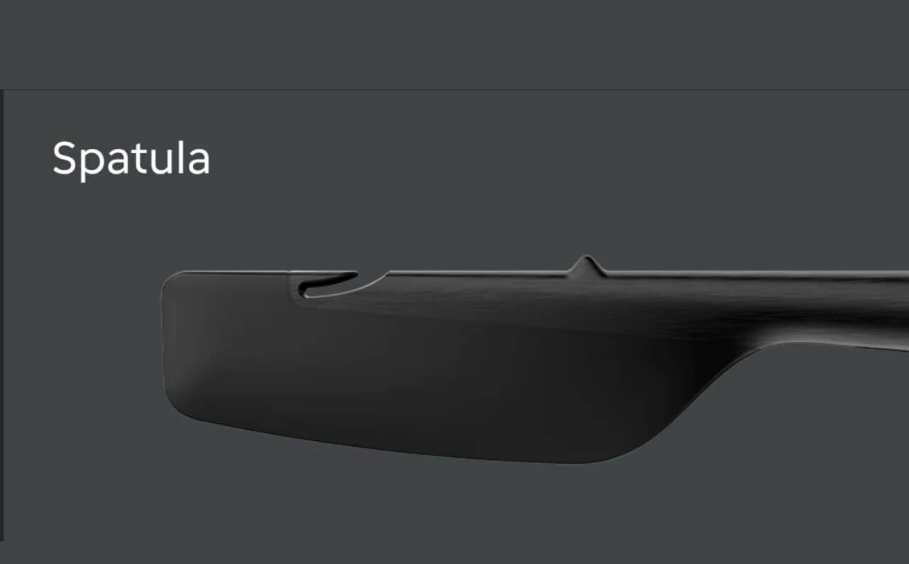 Close-up of the Thermomix 7 spatula, designed for safe, easy mixing and scraping during food preparation.