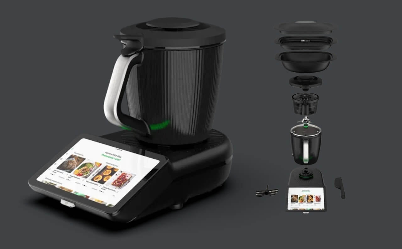 A display of Thermomix 7 accessories, including upgraded mixing bowl, Varoma, and measuring cup, designed for smarter and more efficient cooking.